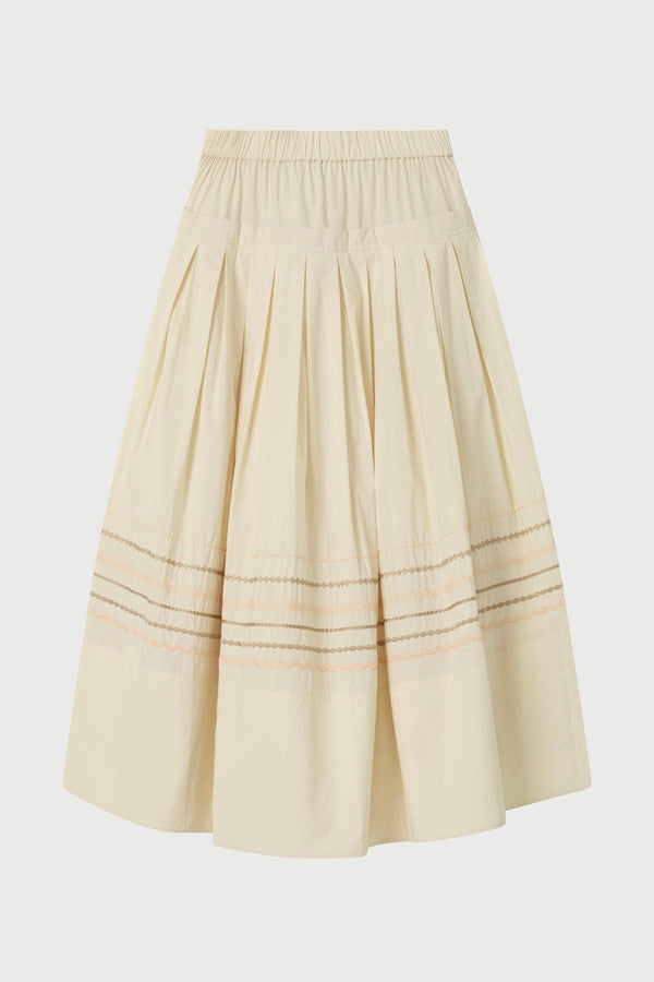 Beige pleated skirt on a white background